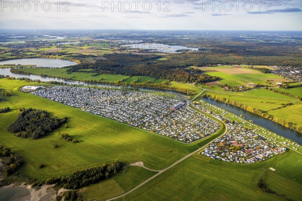 Aerial view, Grav-Insel campground on the Grav Rhine Peninsula, Flürener Feld forest area, distant view and blue sky, shapes and colors, Flürener Feld, Wesel, Lower Rhine, North Rhine-Westphalia, Germany, camping area, motorhome, campsite, DE, recreation center, Europe, leisure, hobby, island, aerial photography, overview, bird's eye view, motorhome, caravan, birds-eyes view, overview
