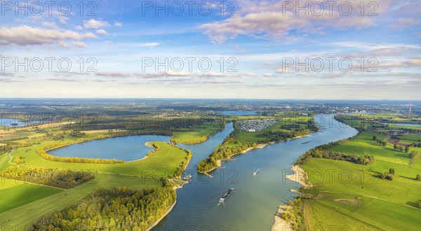 Aerial view, Rhine river with inland navigation on Gravinsel with the campsite, on the left Flürener Altrhein Droste Woy nature reserve, Rheinaue and view to Wesel, Bislich, Wesel, Lower Rhine, North Rhine-Westphalia, Germany, DE, Europe, river, aerial photography, aerial photography, shipping, overview, birds-eyes view, overview
