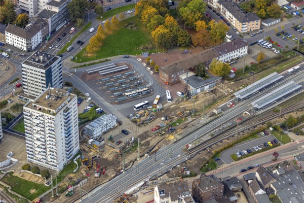 Aerial view, construction site between Franz-Etzel-Platz bus station and Wesel main station Hbf, work on the Betuwe railway line, high-rise buildings Dinslakener Landstraße, Wesel, Lower Rhine, North Rhine-Westphalia, Germany, railway site, construction area, building land, building plots, construction project, construction site, DE, Deutsche Bahn AG, Europe, railway tracks, main station, central station, aerial view, aerial view, aerial photography, overview, bird's eye view, birds-eyes view, overview