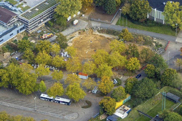 Aerial view, construction site An de Tent, between round sports hall and parking lot, Fusternberg, Wesel, Lower Rhine, North Rhine-Westphalia, Germany, construction area, building plot, construction project, construction site, DE, Europe, aerial photography, aerial photography, overview, birds-eyes view, overview, birds-eyes view, overview