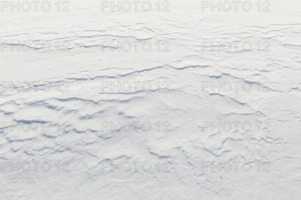 Wind has made patterns on snow surface, Toronsuo National Park, Tammela, Finland