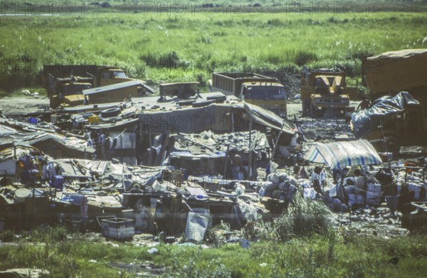 Slum, slum in a swamp area next to a main road, Manila in 1995, Philippines