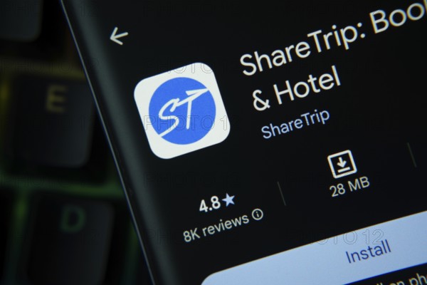 Dhaka, Bangladesh- 27 July 2025: Sharetrip app from Google Playstore is displayed on a smartphone screen