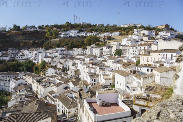 Setenil de las bodegas, cadiz, spain Looking down at setenil de las bodegas, a white village in rural andalusia, with traditional houses built into the rock