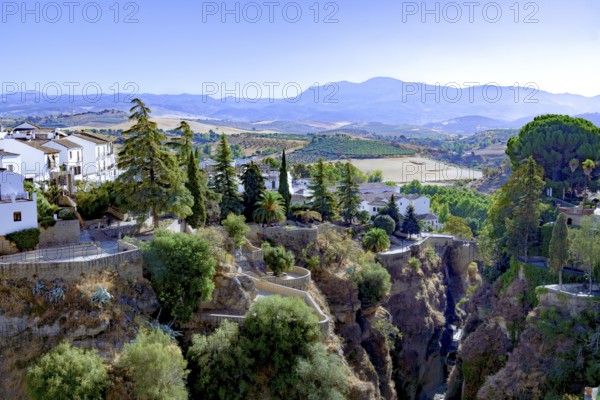 Ronda, malaga, spain, a beautiful white village, presenting its unique architecture on the edge of el tajo gorge