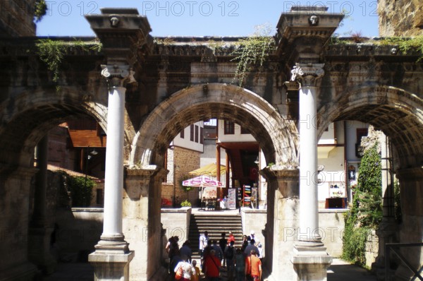 Hadrian's Gate is a triumphal arch located in the ancient Kaleiçi quarter of the resort city of Antalya, on the Mediterranean coast. Built during the Roman Empire to commemorate the arrival of Emperor Hadrian, the gate is a popular landmark for tourists and travelers who come to see the unique ancient Roman architecture of antiquity. Antalya, Turkey