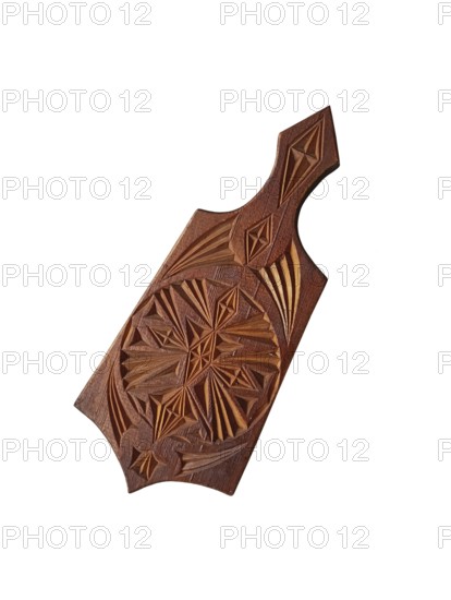 Wooden cutting board for kitchen with geometric patterns on white background