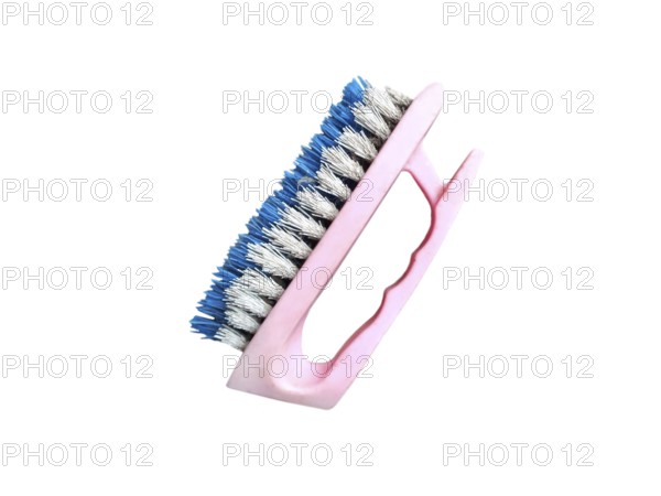 Old plastic shoe cleaning brush on white background