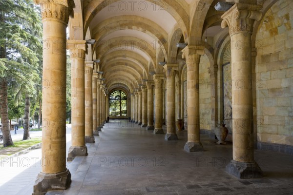 Long, minimalist portico with symmetrical stone arches in a cool interior steeped in history, mineral water gallery in Jermuk, Jermuk, mineral springs, spa town, Wajoz Dzor province, Vayots Dzor, Armenia