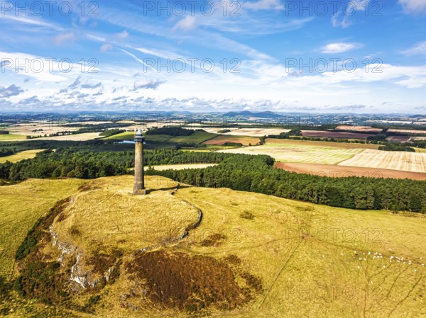 Waterloo Monument over Scottish fields and farms from a drone, Jedburgh, Scotland, UK