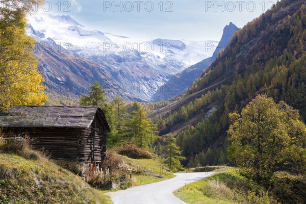 Little wooden hut beside the road going to the far end of the valley. Vintage house from the olden days. Rhone Valley, Valais, Switzerland