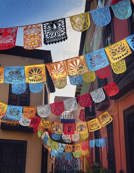 A vibrant display of colorful papel picado decorations hanging across a narrow Mexican street, capturing the festive spirit of Día de Muertos with traditional Mexican decor, AI generated
