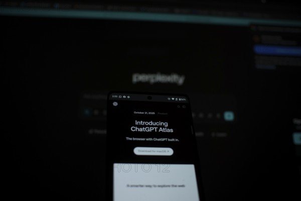 ChatGPT Atlas shown on a smartphone with a dark, perplexity-themed background