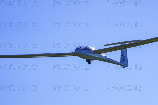 A Schempp-Hirth Nimbus 3MR motor glider, registration D-KERF, during a screening as part of an air show at the Rossfeld Air Sports Association on Rossfeld in Metzingen-Glems, Baden-Württemberg, Germany, for editorial use only