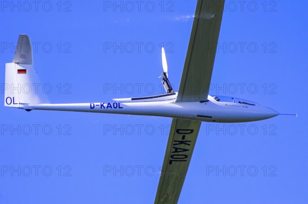 A Schempp-Hirth Nimbus 4M motor glider, D-KAOL registration, during a screening as part of an air show at the Rossfeld Air Sports Association on Rossfeld in Metzingen-Glems, Baden-Württemberg, Germany, for editorial use only