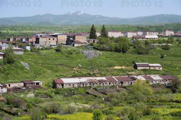 Village with cozy houses surrounded by green hills and mountains, Kechut, Kushchi, Kush-Bilyak, Wajoz Dzor Province, Vayots Dzor, Armenia
