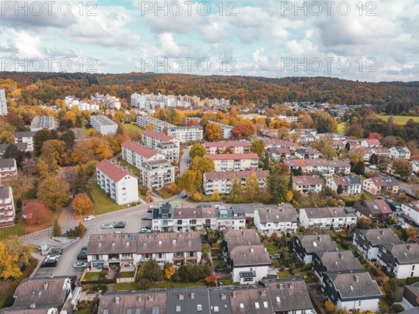 Residential area in autumn colors under bright skies, combining city and nature, Sindelfingen, Böblingen district, Germany