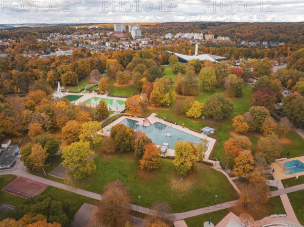 Large municipal park with ponds and colorful autumn trees, ideal for relaxation, Sindelfingen, Böblingen district, Germany