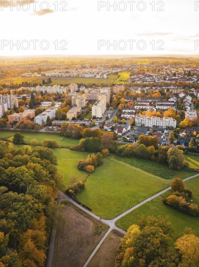 Urban settlement next to forest and green spaces in autumn, Sindelfingen, Böblingen district, Germany