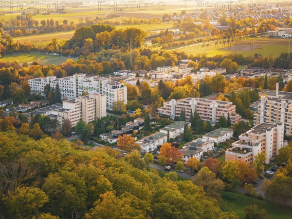 City view with autumn forest and settlements, Sindelfingen, Böblingen district, Germany