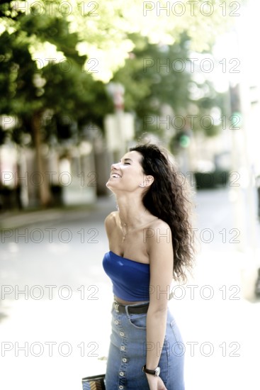 The laughing twisting itself away across body tension, giggle passes on as sweeping liveliness of the MENTAL WANDERING OF A JOKE metaphorically being like dynamics of METAL MAGNETS with poles of direction of energetic flow