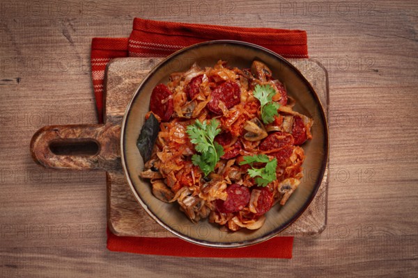 Bigos, bigos Polish dish, stew with cabbage and chorizo sausages, mushrooms, homemade, no people