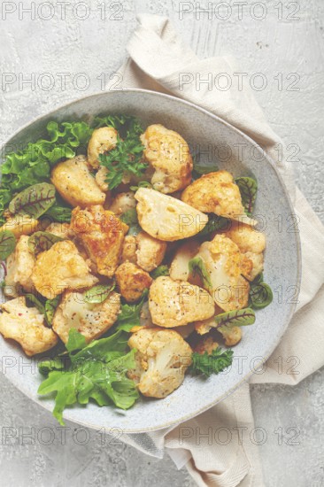 Fried cauliflower salad, with spices and herbs, homemade, no people