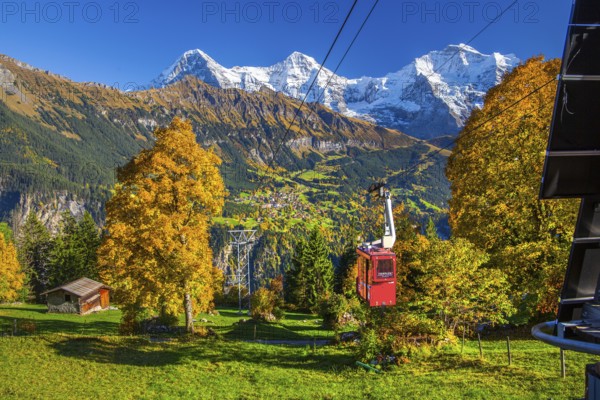 Cable car to the hamlet of Sulwald with views of Wengen, Eiger 3967m, Mönch 4110m and Jungfrau 4158m in autumn, Isenfluh, Lauterbrunnental, Bernese Oberland, Canton of Bern, Switzerland