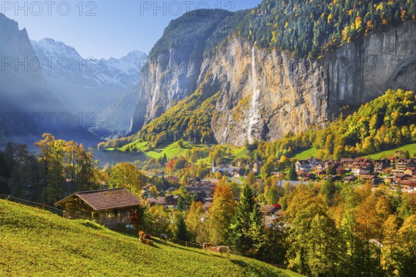 View of town and valley with Staubbach waterfall in autumn, Lauterbrunnen, Bernese Oberland, Canton of Bern, Switzerland