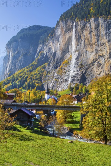 View of town and valley with Staubbach waterfall in autumn, Lauterbrunnen, Bernese Oberland, Canton of Bern, Switzerland