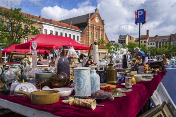 Old vintage things on the street flea market on Place du Jeu de Balle, Marolles district of Brussels, Belgium