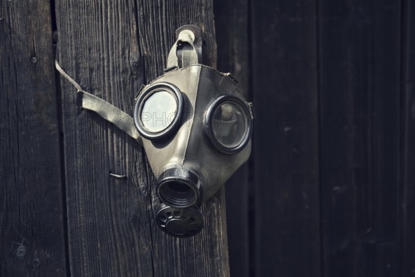 Closeup of a gas mask on a wooden background Prague Czech republic