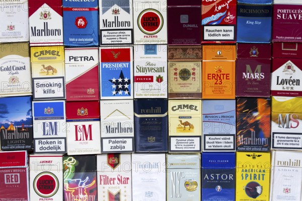 PRAGUE, CZECH REPUBLIC - MARCH 25: Many packs of different cigarettes photographed with top view flat lay composition on March 25, 2017 in Prague, Czech republic