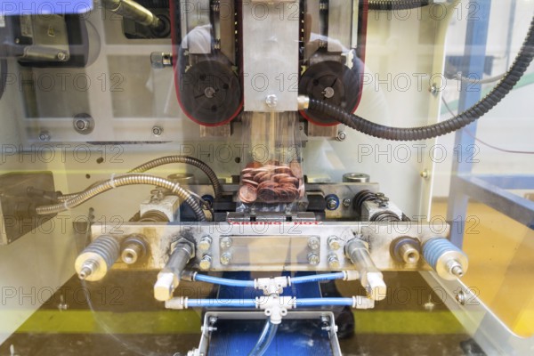 Coins manufactured and packed in money mint machine, steel galvanized with copper Prague Czech republic