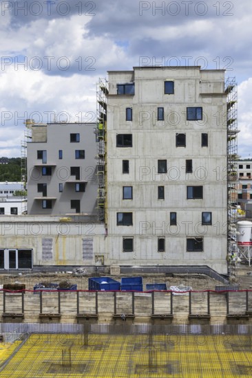 Vertical photo of house apartment construction site with scaffolding Prague, Czech republic