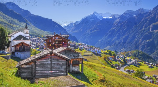 City overview on a mountain terrace above the valley with Ulrichshorn 3925m, Grächen, Mattertal, Valais, Switzerland