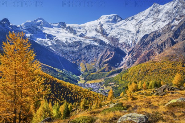 View from Kreuzboden to Saas-Fee with Alalin 4027m and Alphubel 4206m in autumn, Saas-Grund, Saasertal, Valais, Switzerland
