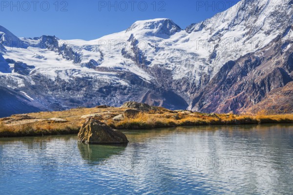 Kreuzbodensee with Alphubel 4206m in autumn, Saas-Grund, Saasertal, Valais, Switzerland