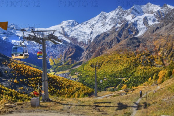 Hohsaas cable car near Kreuzboden mountain station with Alphubel 4206m and Mischabel group 4545m in autumn, Saas-Grund, Saasertal, Valais, Switzerland