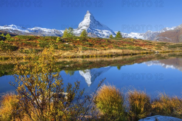 Matterhorn 4478 m with reflection in Leisee on the Sunnegga in autumn, Zermatt, Mattertal, Valais, Switzerland