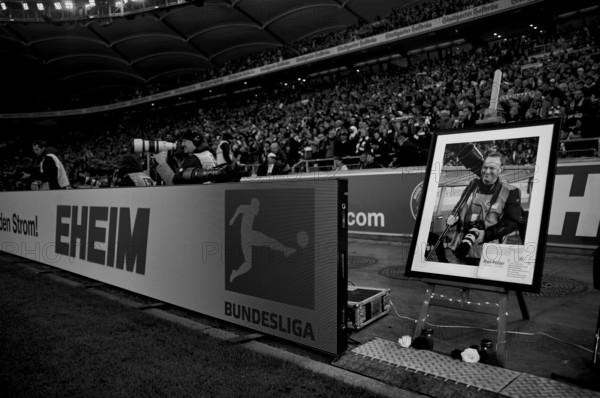 Commemoration of the death of sports photographer Ralf Poller on 14/10/2025, photo on easel, obituary, gang, sacrificial candles, black and white, MHPArena, MHP Arena Stuttgart, Baden-Württemberg, Germany