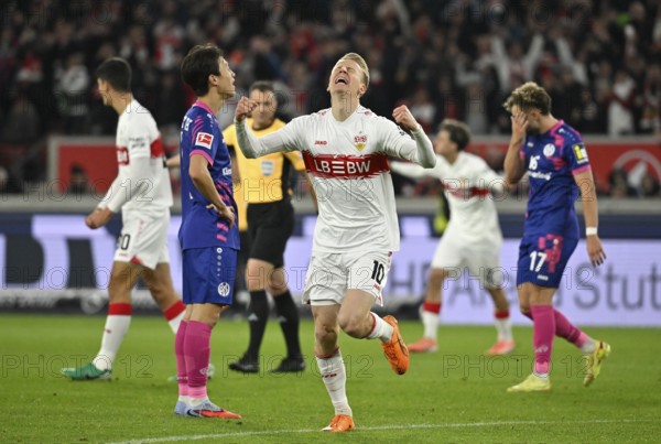 Goal cheers Chris Führich VfB Stuttgart (10) Benedict Hollerbach 1. FSV Mainz 05 (17) Jae-sung Lee 1. FSV Mainz 05 (07) disappointed MHPArena, MHP Arena Stuttgart, Baden-Württemberg, Germany