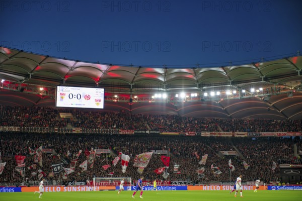 Overview, total, Cannstatt curve, fan block, fans, fan curve, flags, atmosphere, atmospheric VfB Stuttgart, evening game, blue hour, floodlights, score board MHPArena, MHP Arena Stuttgart, Baden-Württemberg, Germany