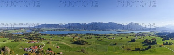 Panoramic view of a vast landscape with Lake Forggensee and mountains on the horizon, near Füssen, Allgäu, Swabia, Bavaria, Germany