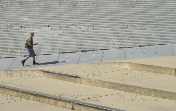 Walkers, stairs, Freedom Square, Tallinn, Estonia