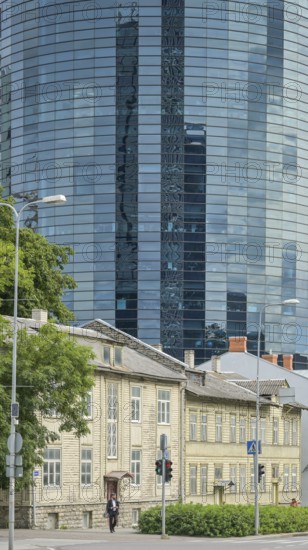 Modern office building, high-rise building, small old building, wooden house, Maakri-Kvartal business district, Liivalaia, Tallinn, Estonia