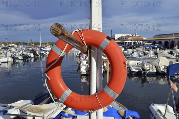 Lifebuoy in the harbor of Colonia Sant Jordi, Majorca, Balearics, Spain