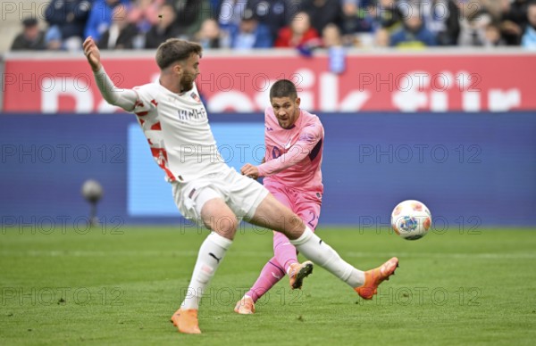Goal action goal opportunity Andrej Kramaric TSG 1899 Hoffenheim (27) shirt of TSG 1899 Hoffenheim, special jersey, action against breast cancer, breast cancer awareness campaign, against Julian Niehues 1. FC Heidenheim 1846 FCH (16) PreZero Arena, Sinsheim, Baden-Württemberg, Germany