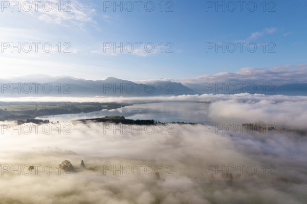 Cloudy landscape with Forggensee and mountain panorama at dawn, near Roßhaupten, Ostallgäu, Allgäu, Swabia, Bavaria, Germany