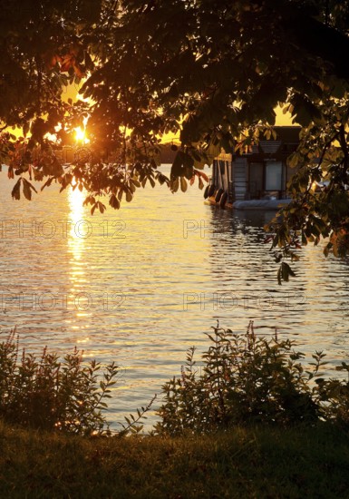 Atmospheric sunset over Lake Gudelack, Lindow (Mark), Stechlin-Ruppiner Land nature park Park, Brandenburg, Germany